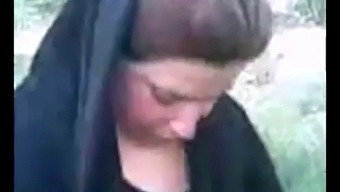 Hijab-Wearing Woman Indulges In Outdoor Sexual Encounter